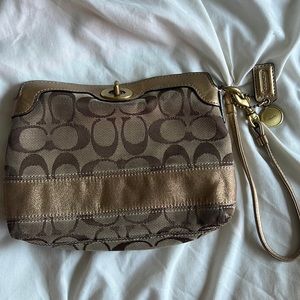 cute coach wristlet colored inside!